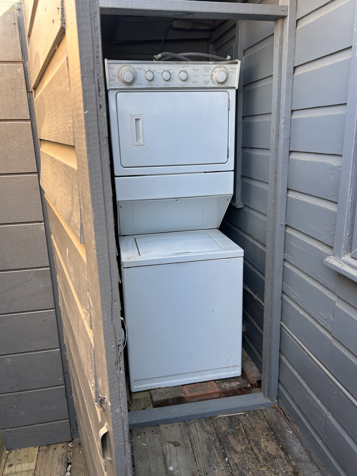 1922 Vassar Street Houston, TX 77098 - Photo 25 of 27 a utility room with dryer and washer