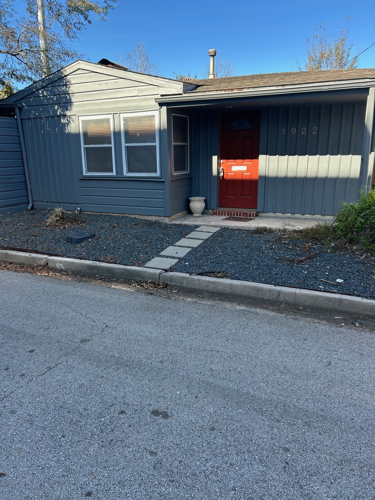 1922 Vassar Street Houston, TX 77098 - Photo 27 of 27 a front view of a house with a yard and garage