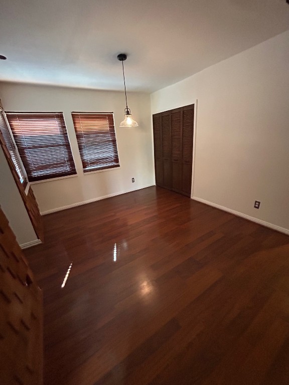 1922 Vassar Street Houston, TX 77098 - Photo 7 of 27 Dining area with a closet in the far corner. These windows overlook Vassar Street. Front door immediately to the left.
