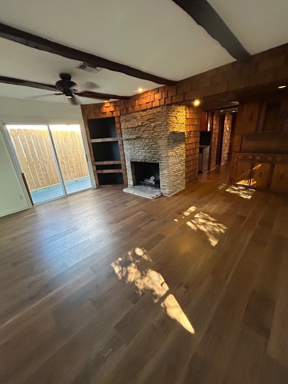 1922 Vassar Street Houston, TX 77098 - Photo 10 of 27 Living room with fireplace. Glass sliding doors to the walkway leading to the driveway.