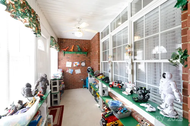 a view of an chairs and tables in patio