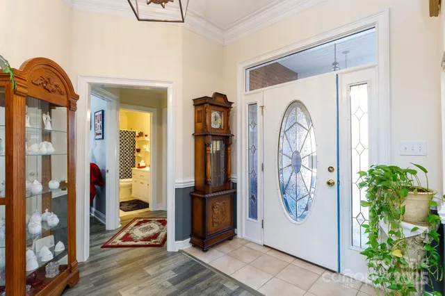 a view of front door with wooden floor