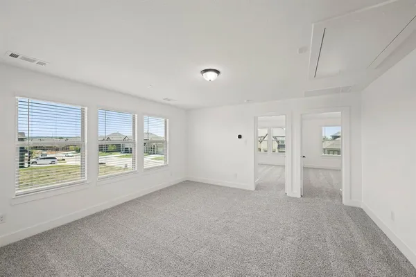 a view of empty room with a window