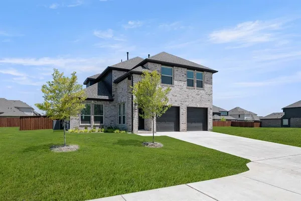 a front view of house with yard