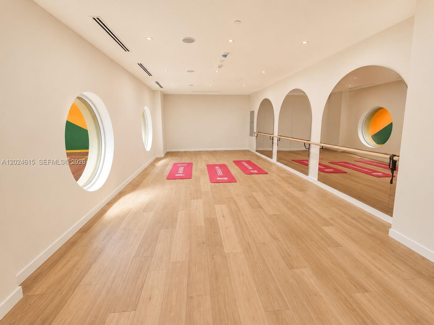 90 Northeast 32nd Street, Unit 301 Miami, FL 33127 - Photo 14 of 21 a view of a room with wooden floor