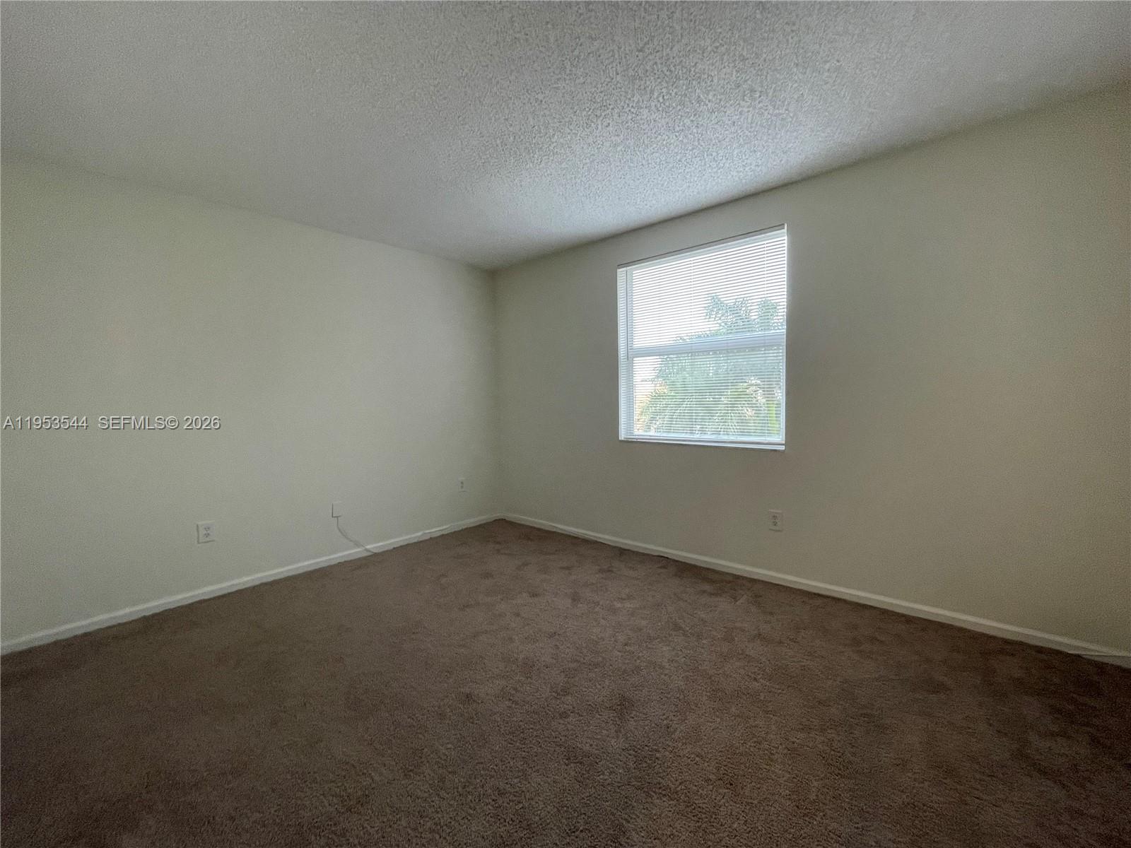 17125 North Bay Road, Unit 3404 Sunny Isles Beach, FL 33160 - Photo 13 of 20 an empty room with a window