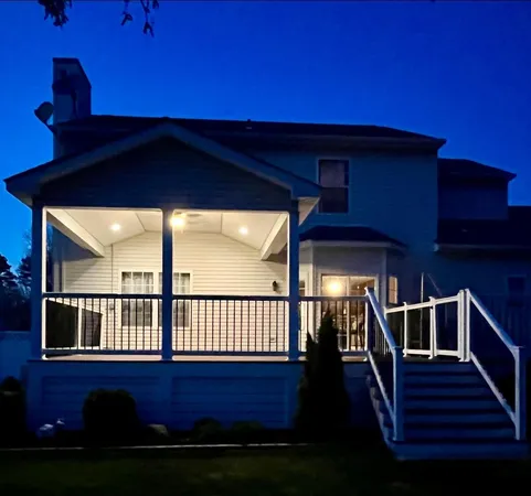 a view of balcony with wooden floor