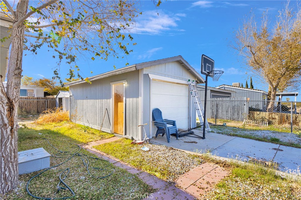 19044 Joshua Street Adelanto, CA 92301 - Photo 18 of 34 a view of a backyard with a patio