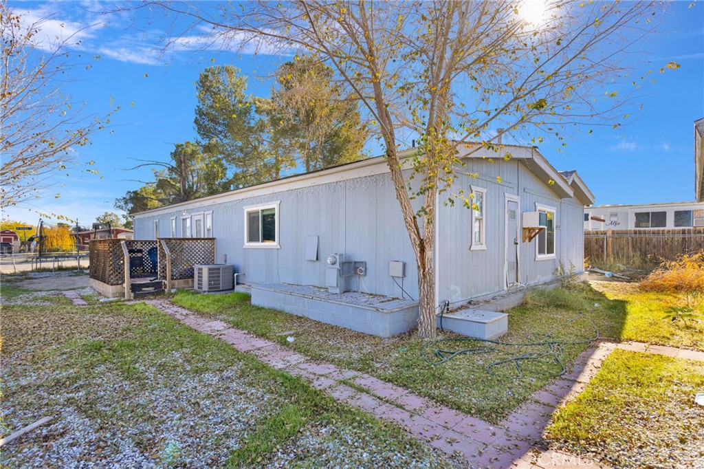 19044 Joshua Street Adelanto, CA 92301 - Photo 20 of 34 a view of a house with a yard