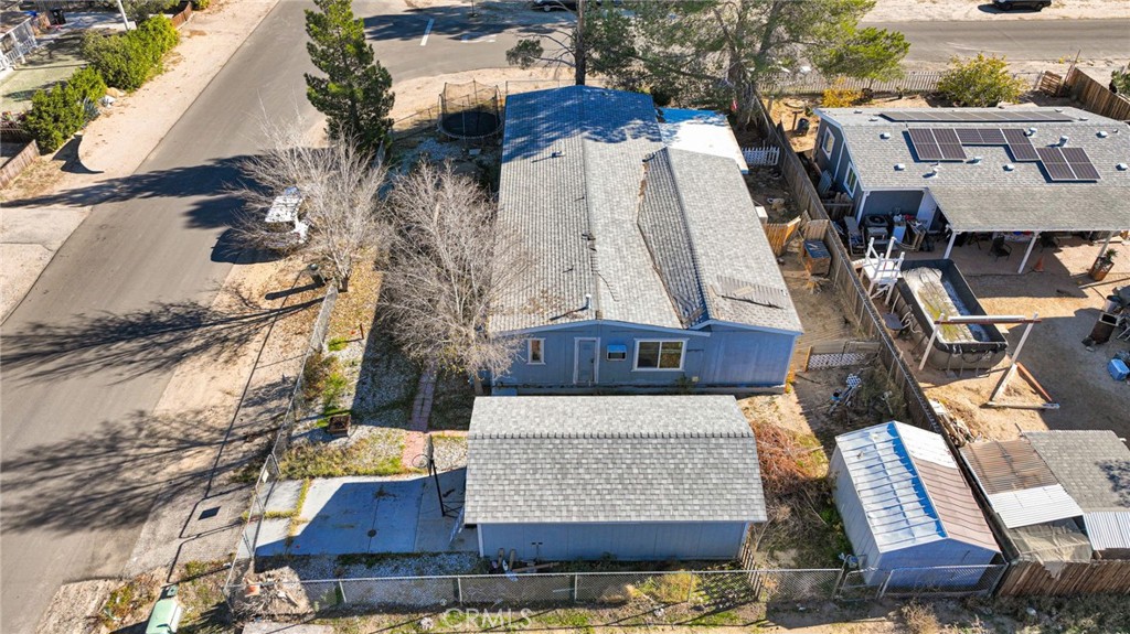 19044 Joshua Street Adelanto, CA 92301 - Photo 27 of 34 an aerial view of houses with outdoor space
