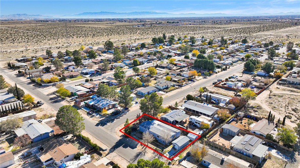 19044 Joshua Street Adelanto, CA 92301 - Photo 30 of 34 an aerial view of a city with lots of residential buildings