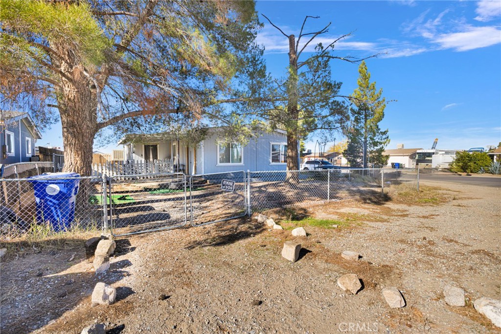 19044 Joshua Street Adelanto, CA 92301 - Photo 3 of 34 a view of outdoor space yard and swimming pool