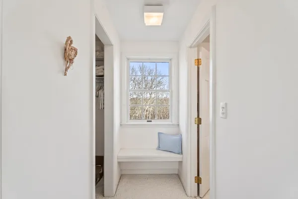a view of balcony with wooden floor and fence