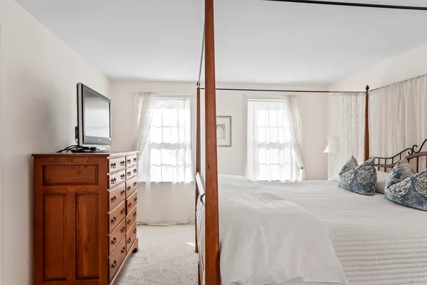 a picture of a bathroom with a shower