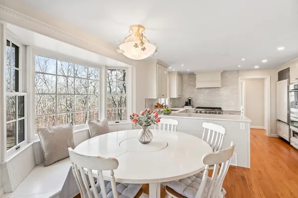 a kitchen that has a sink and a stove
