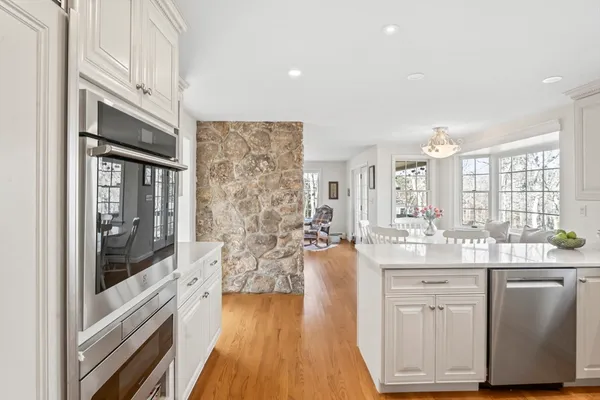a view of a chairs and table on the deck