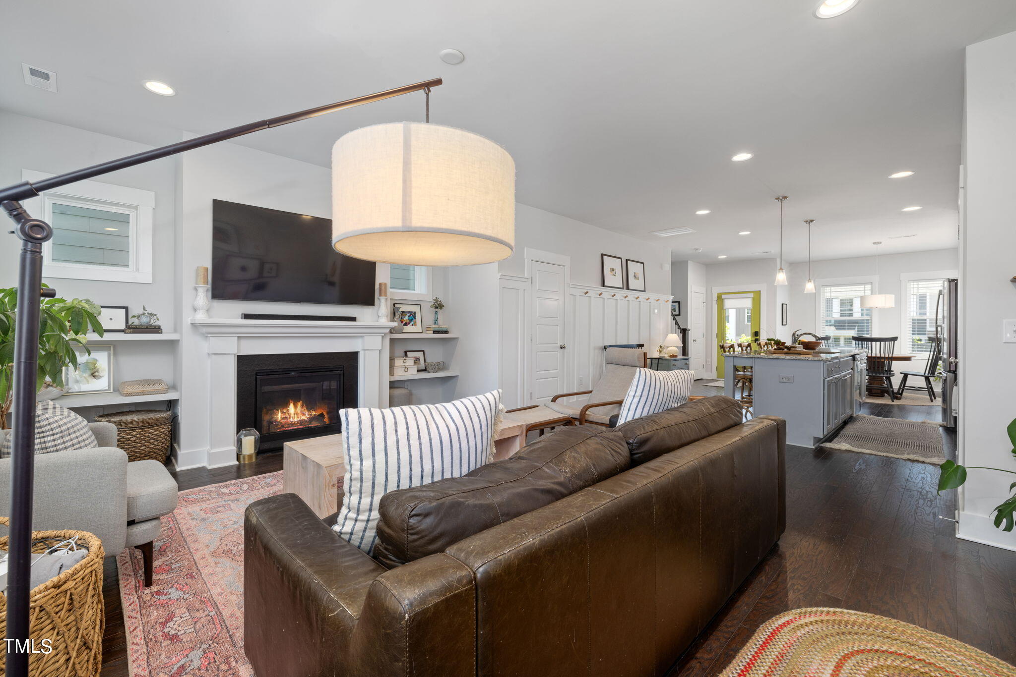 269 Douglas Falls Drive Wendell, NC 27591 - Photo 15 of 51 a living room with furniture fireplace and a flat screen tv