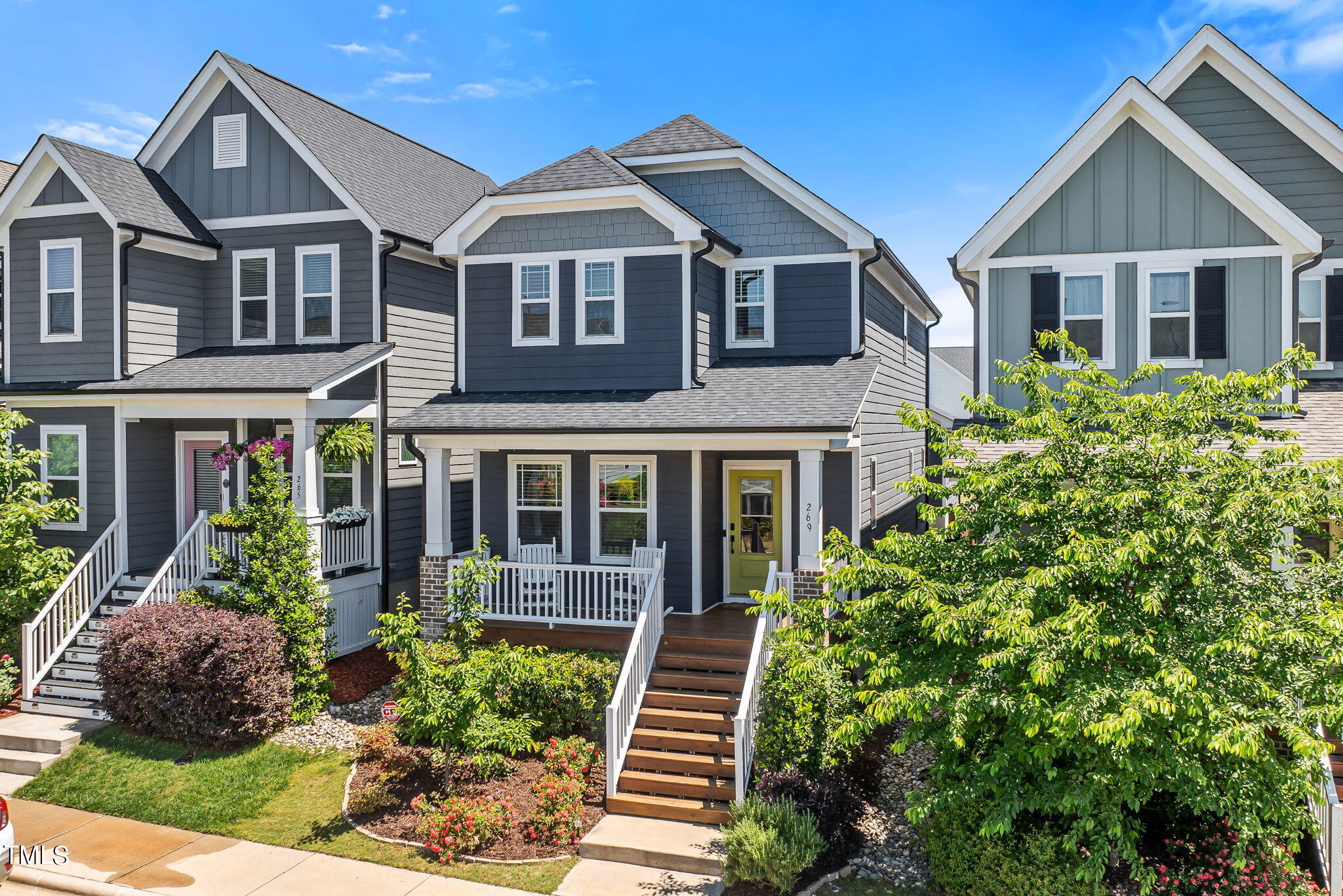 269 Douglas Falls Drive Wendell, NC 27591 - Photo 2 of 51 a front view of a house with garden