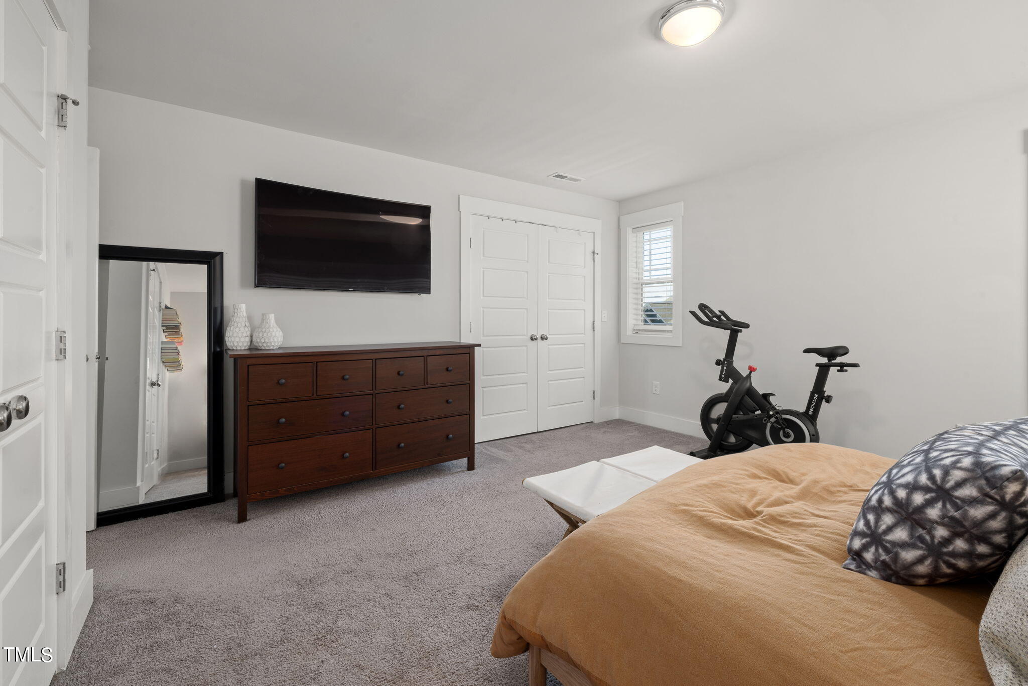269 Douglas Falls Drive Wendell, NC 27591 - Photo 25 of 51 a bedroom with a bed and a television