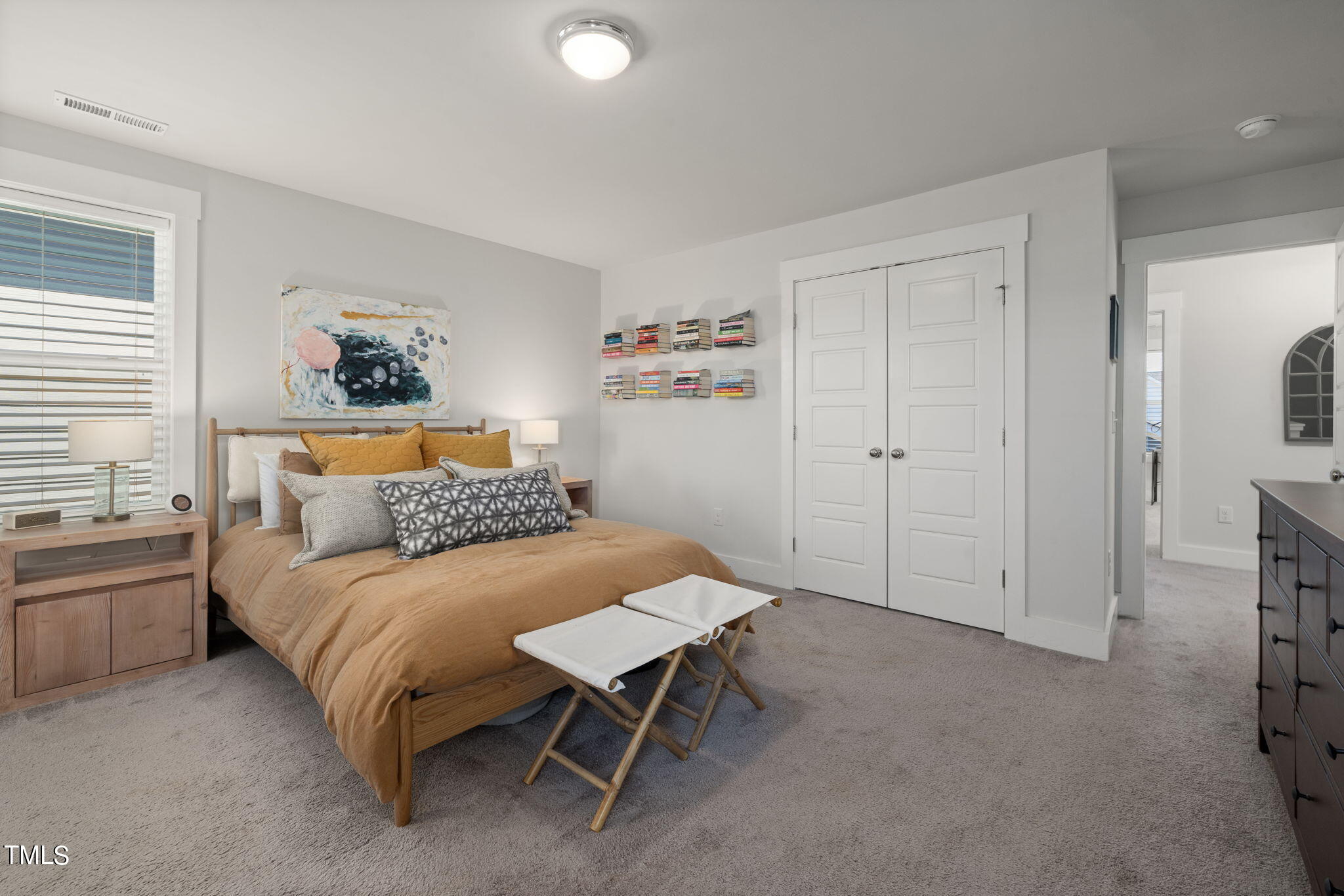 269 Douglas Falls Drive Wendell, NC 27591 - Photo 26 of 51 a bedroom with a bed and a cabinets