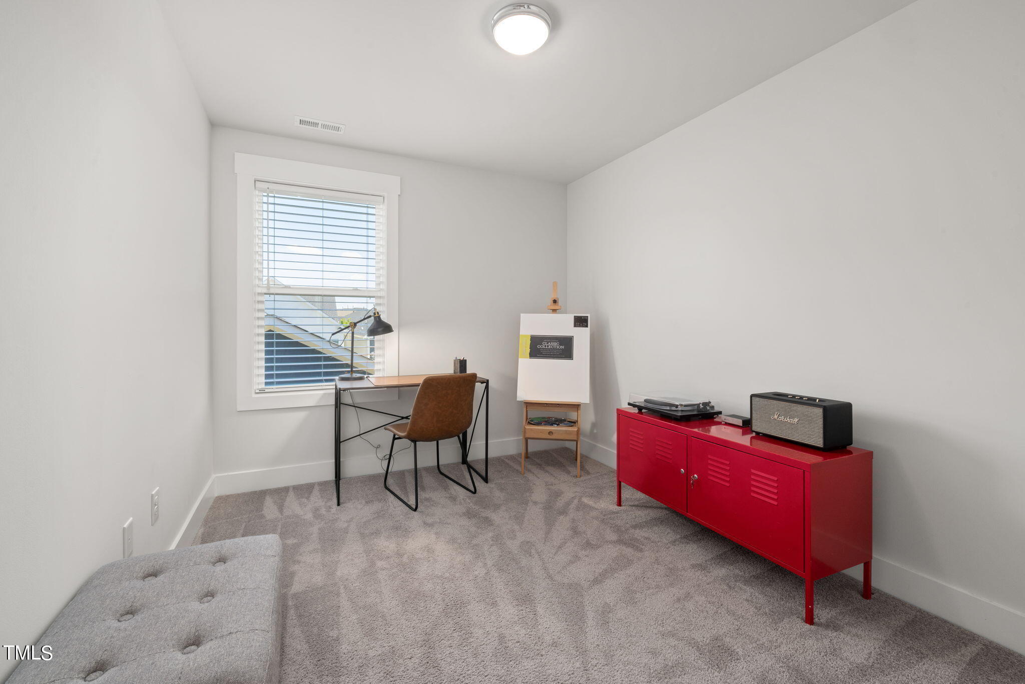 269 Douglas Falls Drive Wendell, NC 27591 - Photo 29 of 51 a living room with furniture and a window