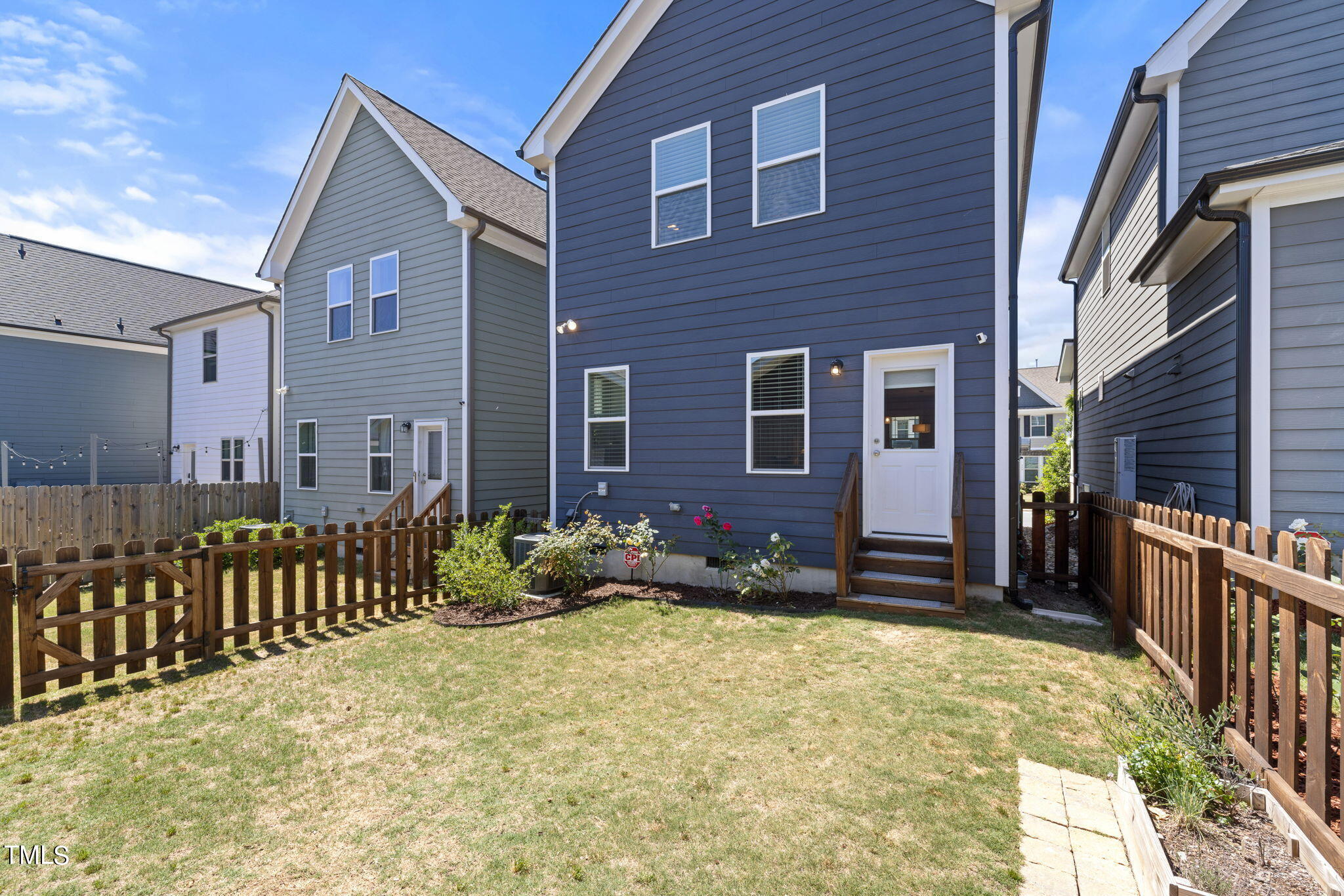 269 Douglas Falls Drive Wendell, NC 27591 - Photo 34 of 51 a view of a house with a yard
