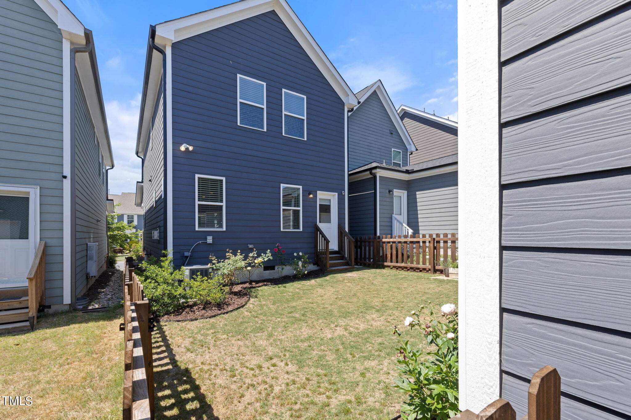 269 Douglas Falls Drive Wendell, NC 27591 - Photo 35 of 51 a view of a house with a yard and sitting area