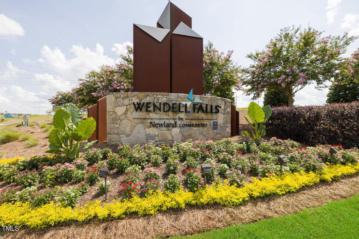 269 Douglas Falls Drive Wendell, NC 27591 - Photo 37 of 51 a sign board with buildings in the background