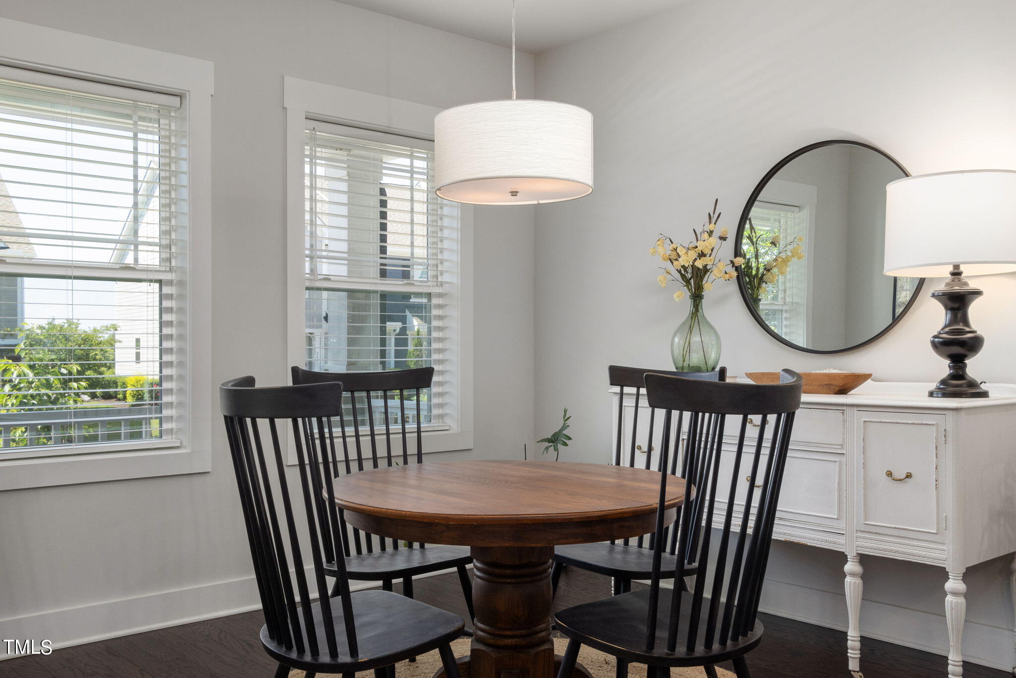 269 Douglas Falls Drive Wendell, NC 27591 - Photo 8 of 51 a view of a dining room with furniture window and wooden floor