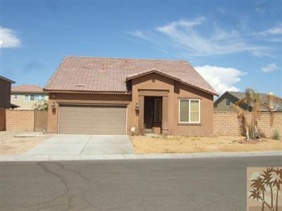 37243 Haweswater Road Indio, CA 92203 - Photo 1 of 14 a front view of a house with a yard