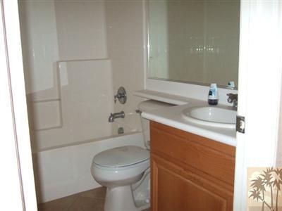37243 Haweswater Road Indio, CA 92203 - Photo 5 of 14 a bathroom with a sink a toilet and shower