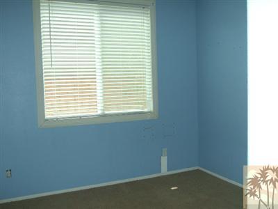 37243 Haweswater Road Indio, CA 92203 - Photo 6 of 14 an empty room with a window