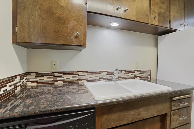 a close view of sink and microwave