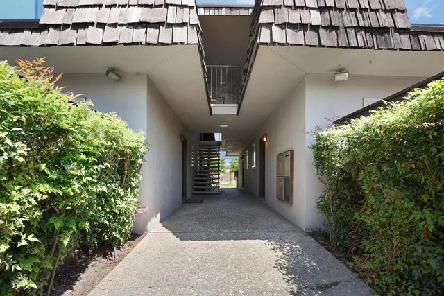 a view of a balcony with an outdoor space