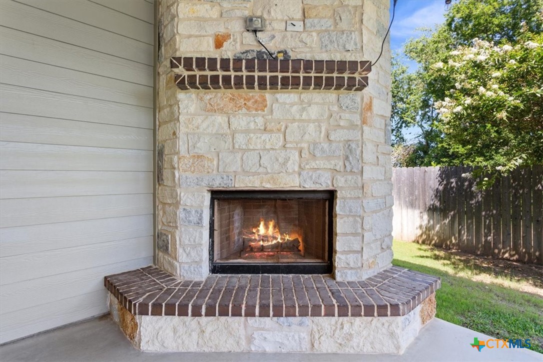 1115 Rhodactis Drive Temple, TX 76502 - Photo 31 of 35 Back Patio Fireplace