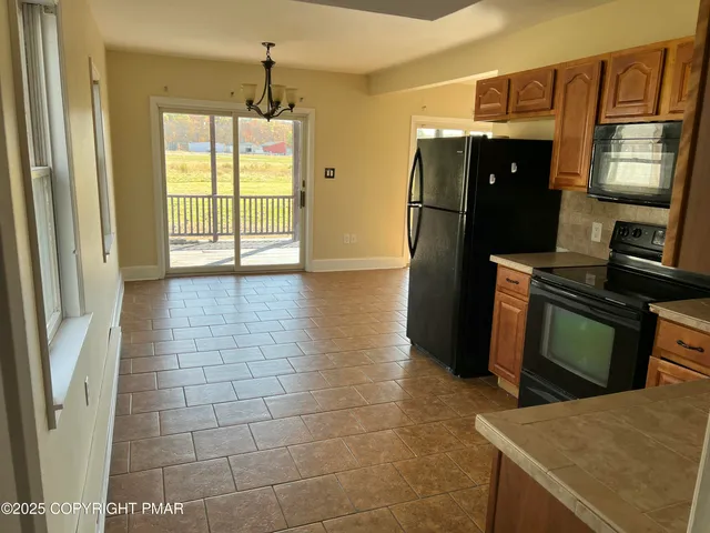 a view of a hallway with windows