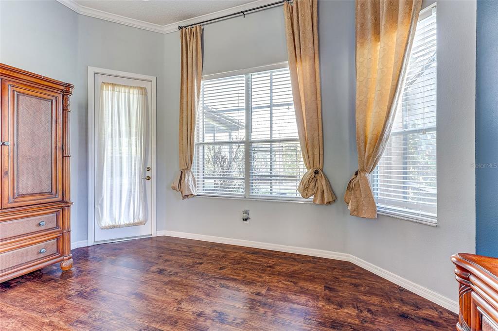 918 Algare Loop Windermere, FL 34786 - Photo 34 of 73 a view of an empty room with wooden floor and a window