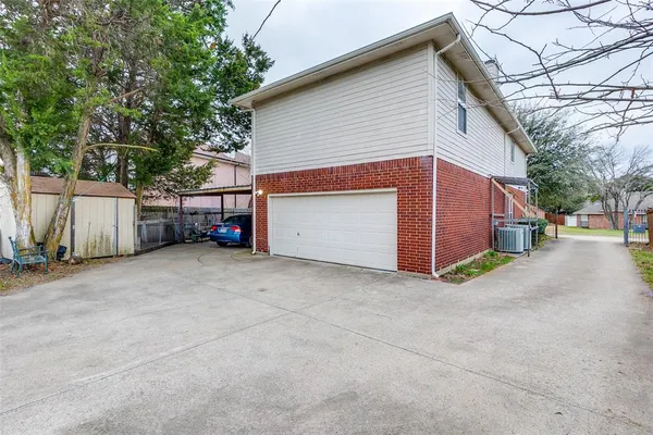 a view of a house with a garage