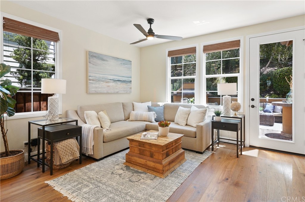 56 Tuberose Street Ladera Ranch, CA 92694 - Photo 20 of 55 a living room with furniture and windows