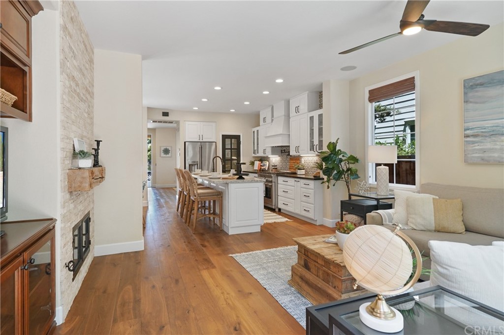 56 Tuberose Street Ladera Ranch, CA 92694 - Photo 23 of 55 a living room with furniture and kitchen view