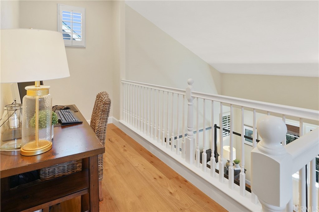 56 Tuberose Street Ladera Ranch, CA 92694 - Photo 26 of 55 a view of staircase and living room with windows