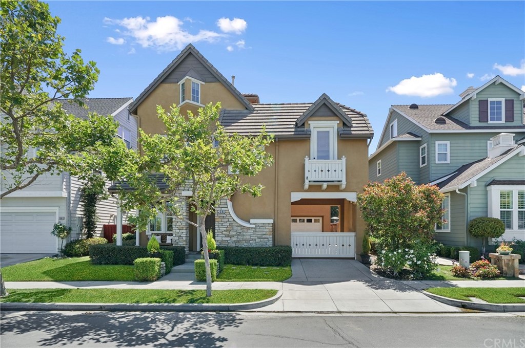56 Tuberose Street Ladera Ranch, CA 92694 - Photo 3 of 55 a front view of a house with garden