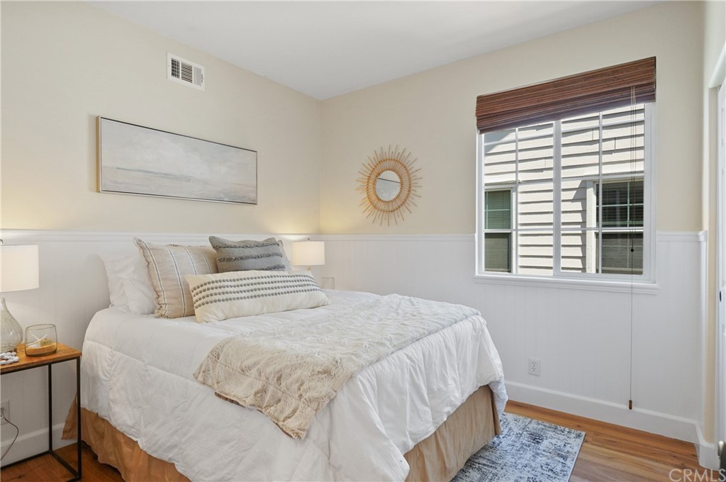 56 Tuberose Street Ladera Ranch, CA 92694 - Photo 31 of 55 a bedroom with a bed and a window