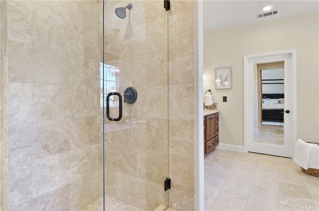 56 Tuberose Street Ladera Ranch, CA 92694 - Photo 39 of 55 a bathroom with a shower