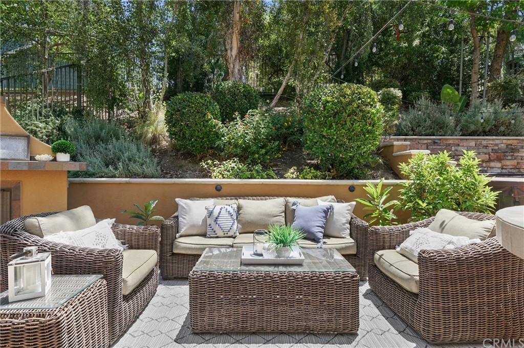 56 Tuberose Street Ladera Ranch, CA 92694 - Photo 48 of 55 a outdoor living space with furniture and garden view