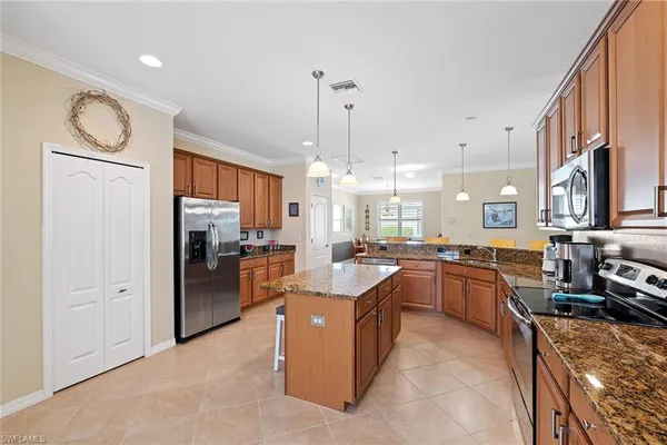 a large kitchen with cabinets