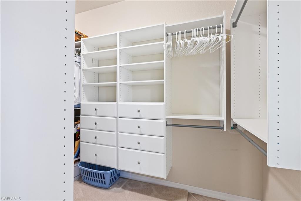 3837 Ruby Way Naples, FL 34114 - Photo 18 of 31 a view of an empty walk in closet