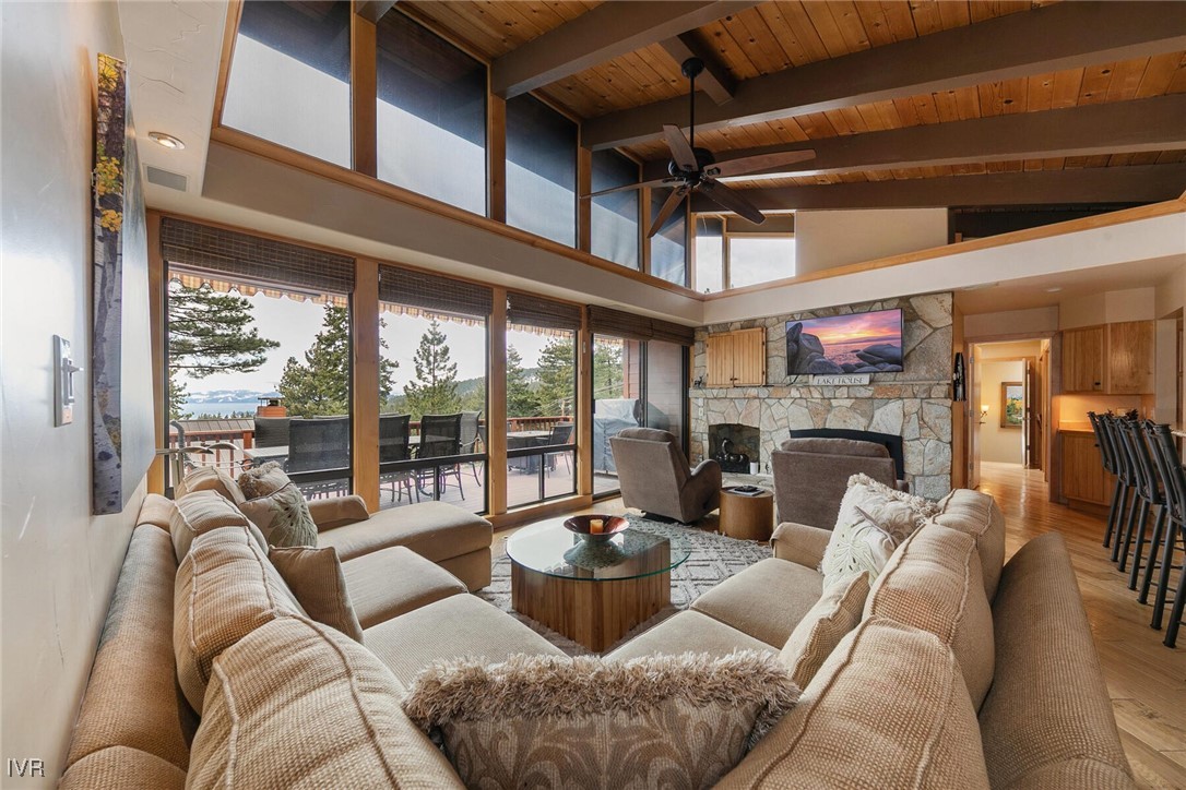 725 Fairview Boulevard, Unit 11 Incline Village, NV 89451 - Photo 1 of 45 a living room with furniture fireplace and a large window