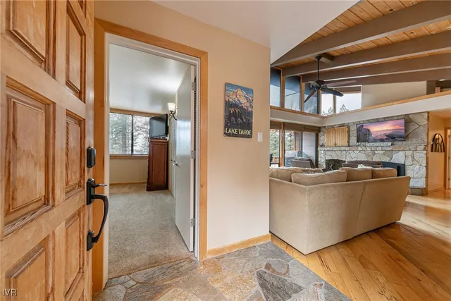 a bed room with a bed and a television