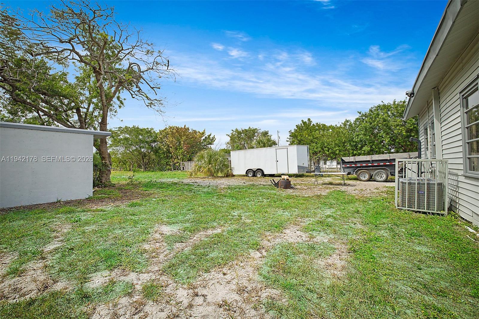 3021 Avenue J Riviera Beach, FL 33404 - Photo 3 of 17 a view of a back yard